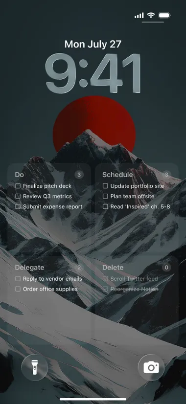 iPhone lock screen: the priority matrix over a photo of a red sun behind snowy peaks